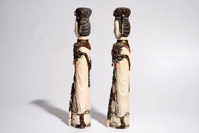 A pair of large polychrome ivory ladies with removable heads, 19/20th C.